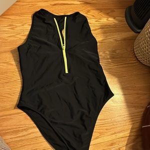Black (racer back)one piece swim with neon zipper